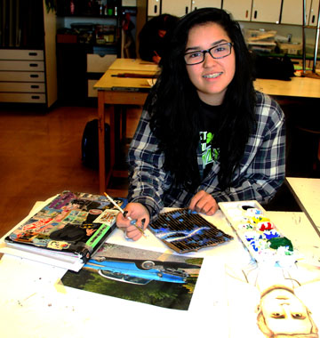 Grecia Becerra working on pieces for her art class at Highland