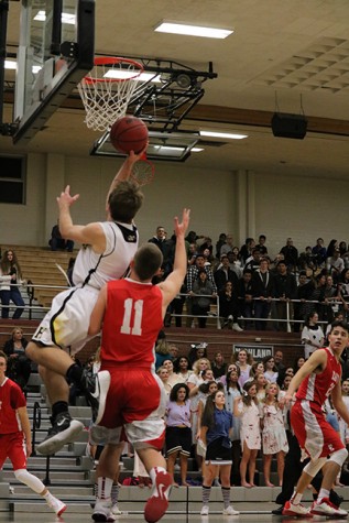 Will Trice goes up for a layup against East.