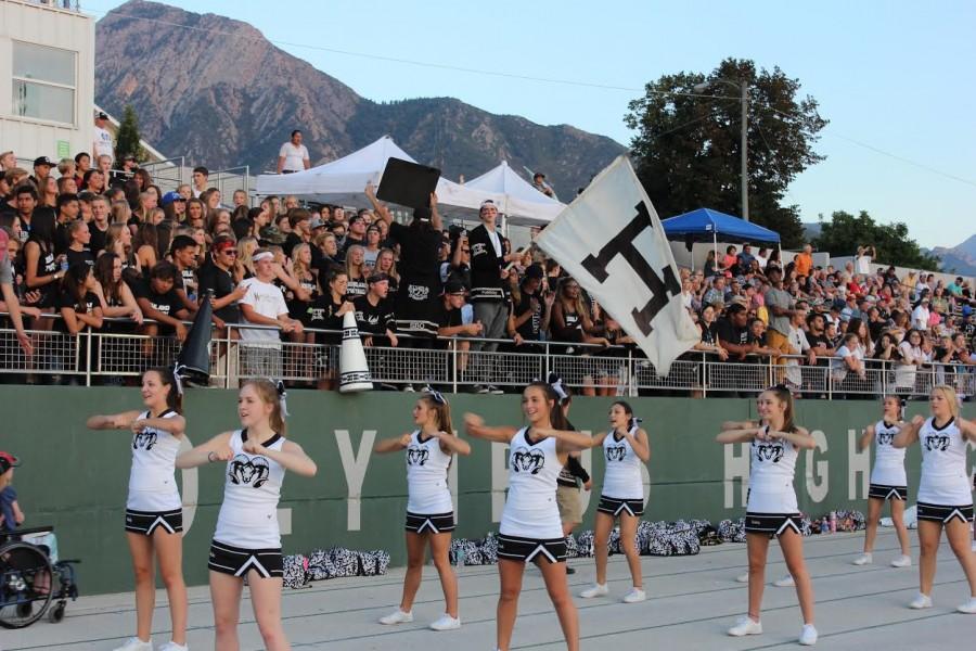 The black hole cheers on their Highland Rams against Olympus.