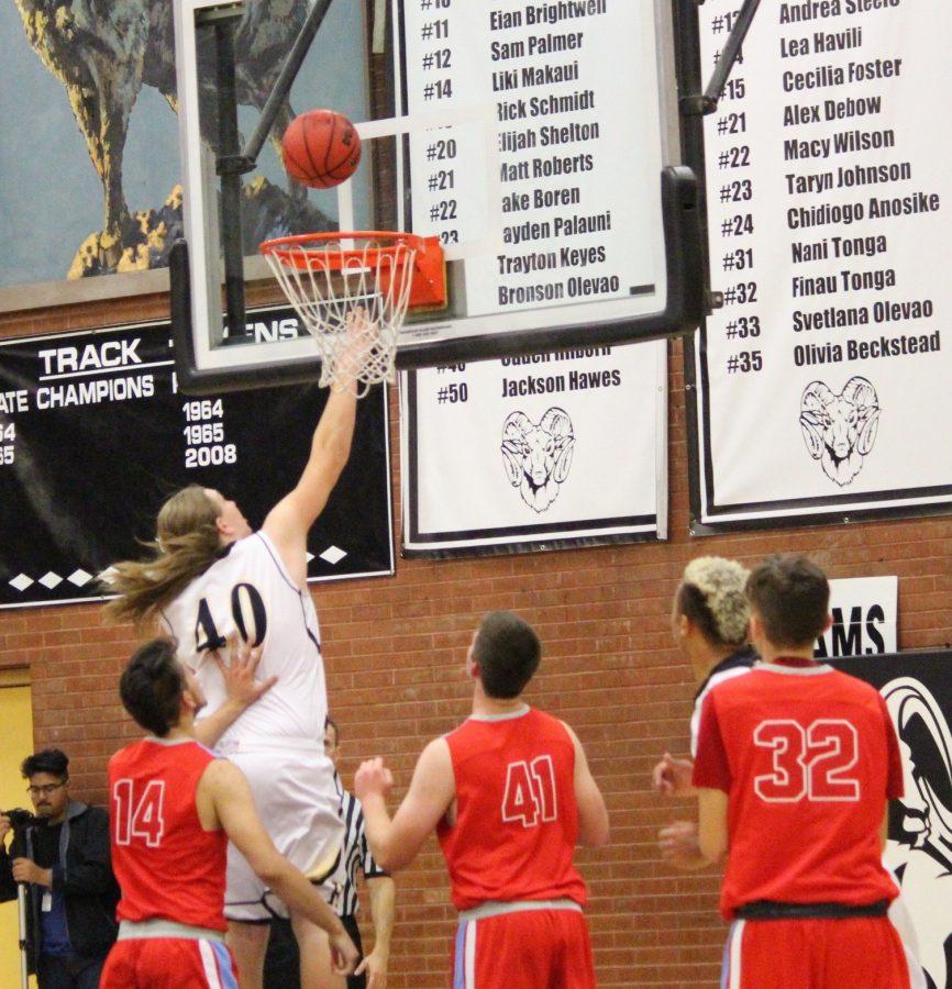 Center, Cody Hilborn with a lay up