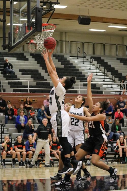 Junior Misini Fifita goes up to the basket for a lay-up.