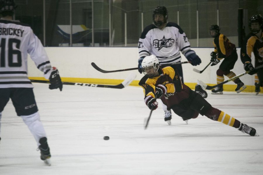 A UCI North player attempts to shoot a goal.