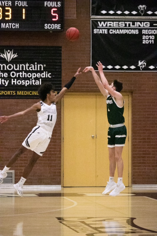 Elijah Tolbert leaps for the ball. 