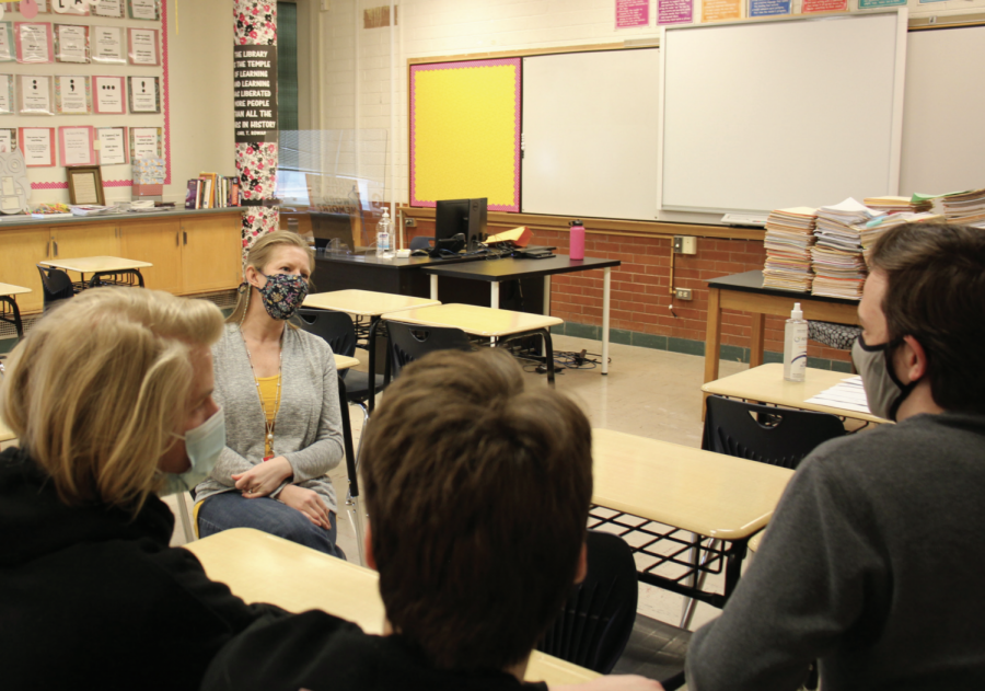 Becky Blommer talks to a group of her senior students on her last day of teaching at Highland.