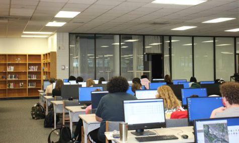 Highland students take a test in the library
