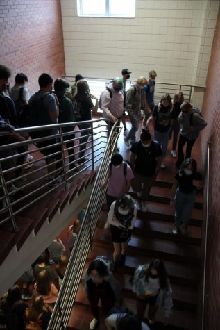 Students leave the building during the fire drill on Sept. 2. 