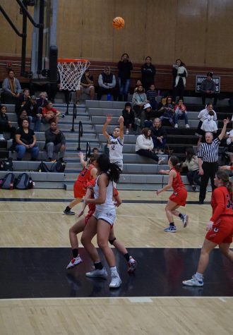 Highlands Umu Tukuafu hits a three pointer against Uintah in the Rams playoff victory.