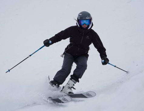 Amelia Sogard rushes down the slope of Alta Ski Area during a freeride on December 10th, 2022. 