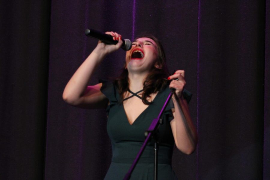 Sarah Kurth performs a vocal solo during the talent show.