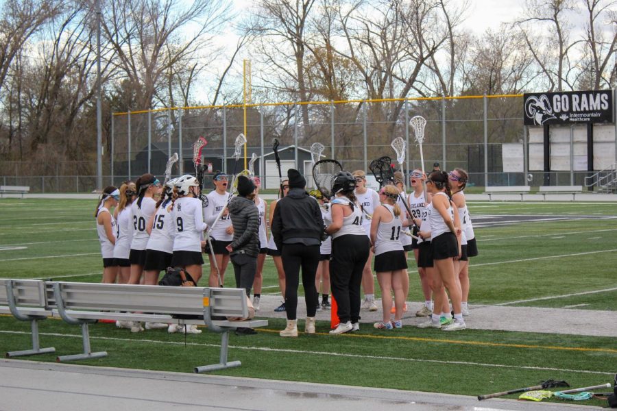 The Highland Girls Lacrosse team gets hyped up before their match. 