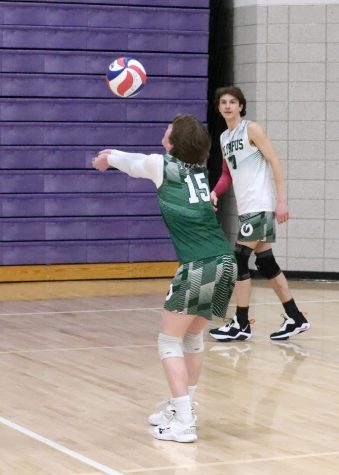 Torin Stewart, left, plays during an Olympus High boys volleyball match.
