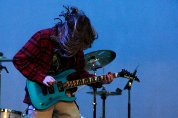 Guitarist Jonah Russell thrills the crowd with a head-banging breakdown at Highlands talent show on January 26th. 