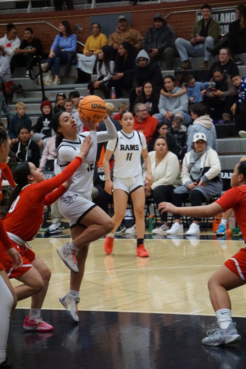Highland player Danae Asiata goes to shoot the ball during Freak East on Jan. 12th. 