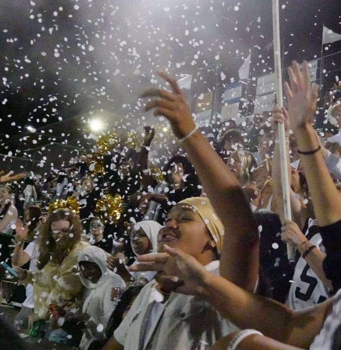 Highland students cheer on the football team at the homecoming game against Alta High School