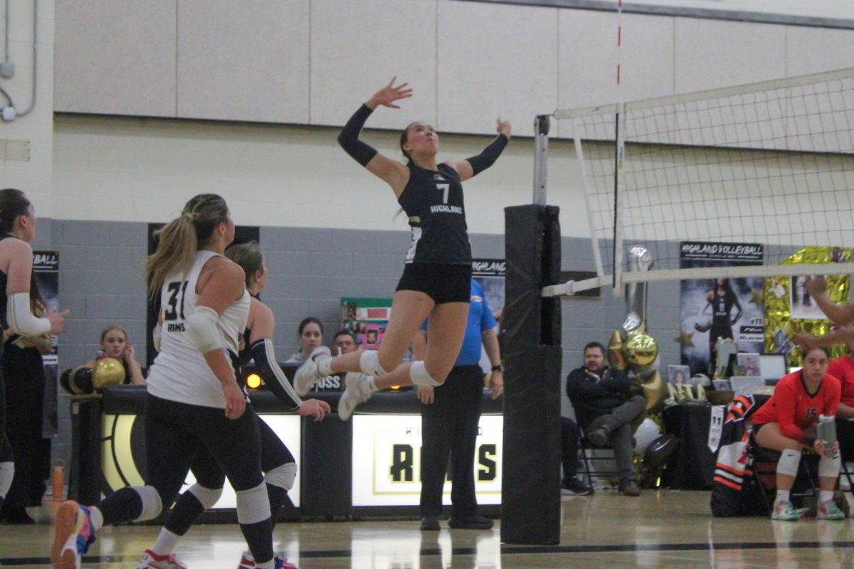 Volleyball player Alicia Sherod in a game against West 