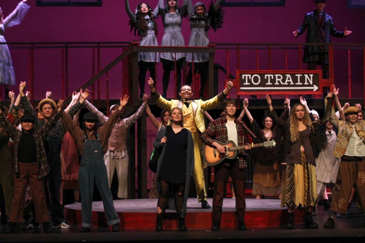 Grace Croft as Eurydice and Harper Pierce as Orpheus during Hadestown. 