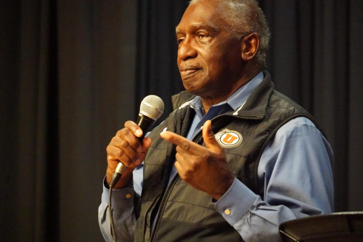 Reverend France Davis speaks to students at a Ram Fam event.