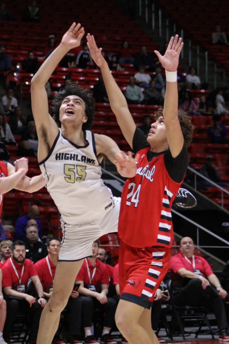 Vai Higby (55) battles for a rebound during Highland's victory over Bountiful.