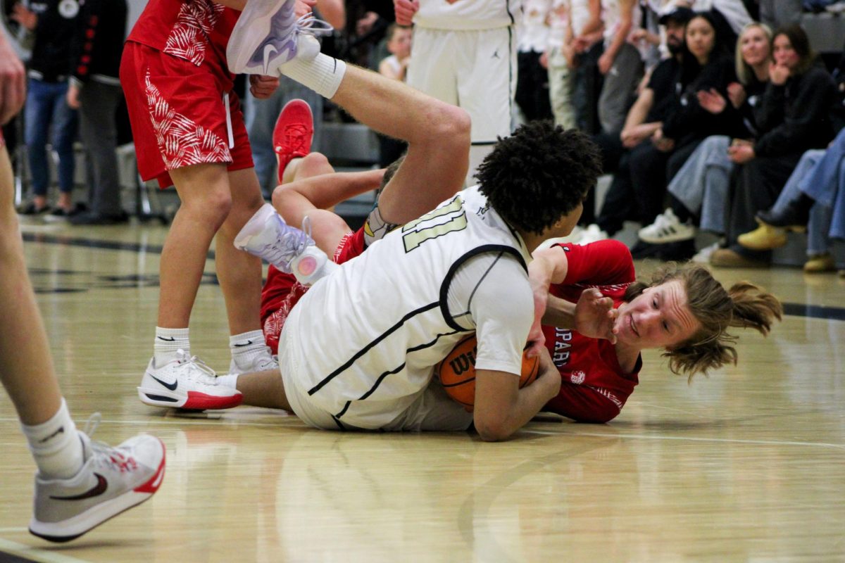 Isaiah Drisdom wrestles for a loose ball. 