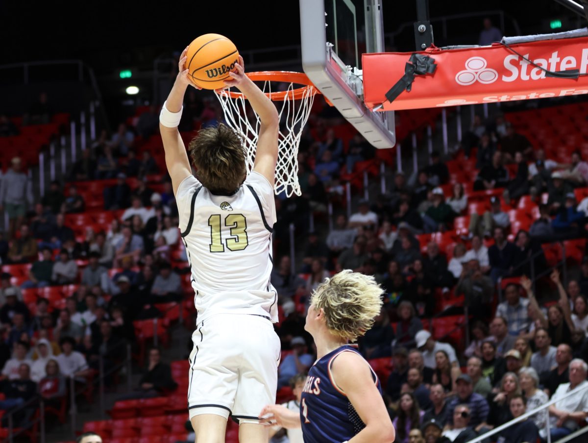 Junior Soren Ries throws down a dunk in the fourth quarter.