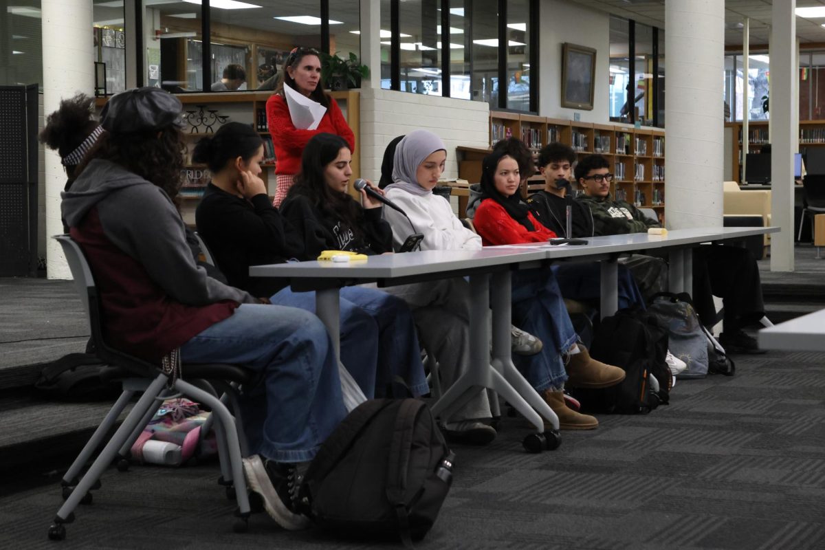 A group of Highland students speak about their experiences as either refugees or children of immigrants.